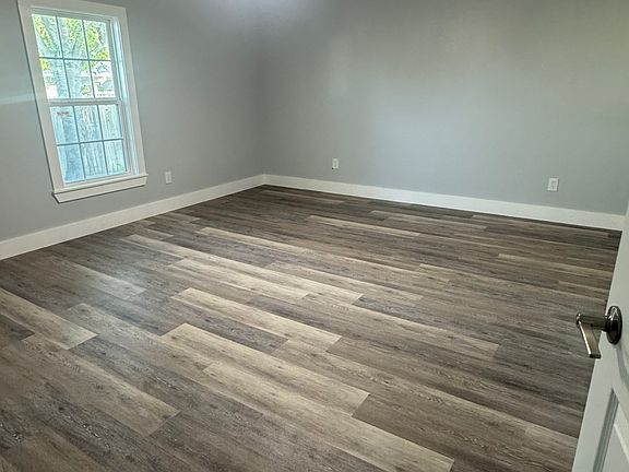 Bedroom one, very spacious and new ceiling fan