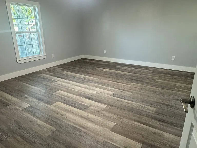 Bedroom one, very spacious and new ceiling fan