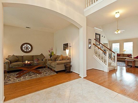 WALK IN WITH FRONT LIVING AREA, AND OPEN TO MAIN FAMILY ROOM