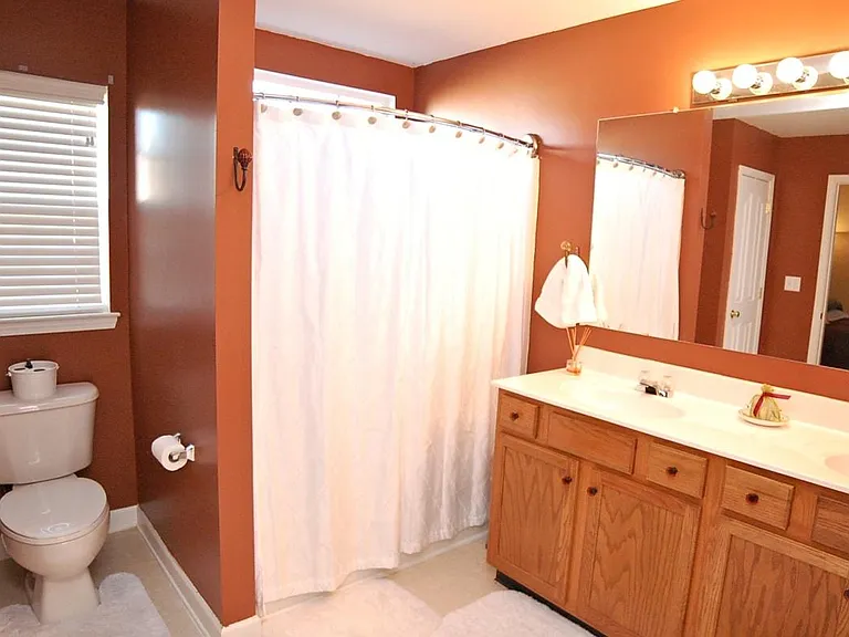 Main Bath-Toilet, tub/shower combo,dual sink and huge walk in closet in this oversized bath