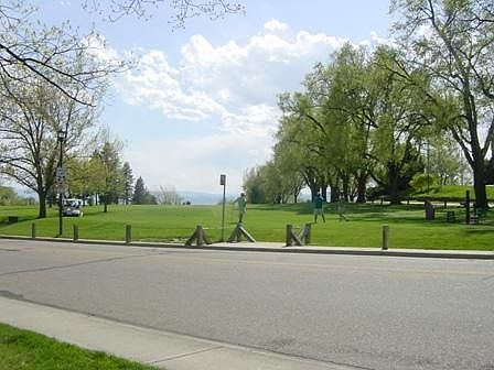 Golf course and mountains across street