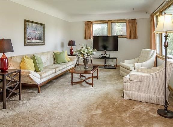 Living room offers a bright comfortable space to relax.