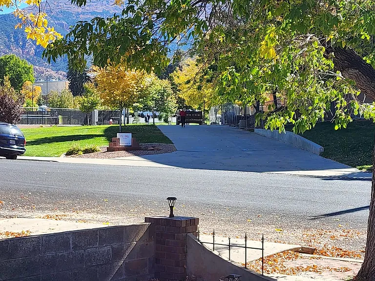 Across the street from SUU's P.E. building, pickleball courts, volleyball courts, and a large field.