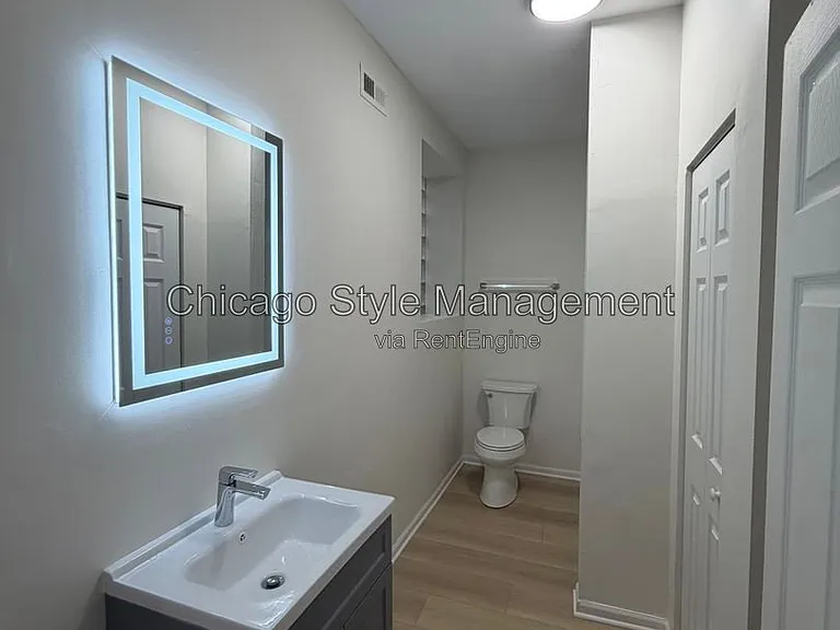 7833 S Colfax Ave — Photo 1