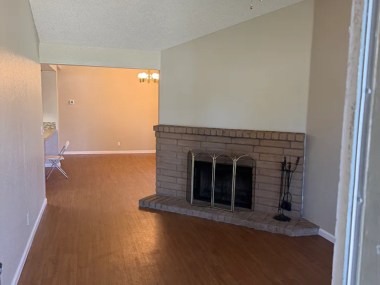 walk into living room with fireplace