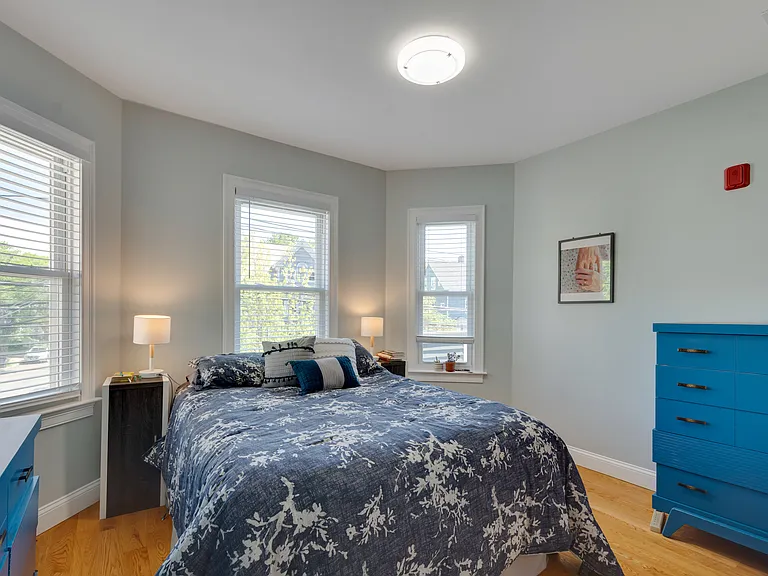 Large bedroom with bay windows