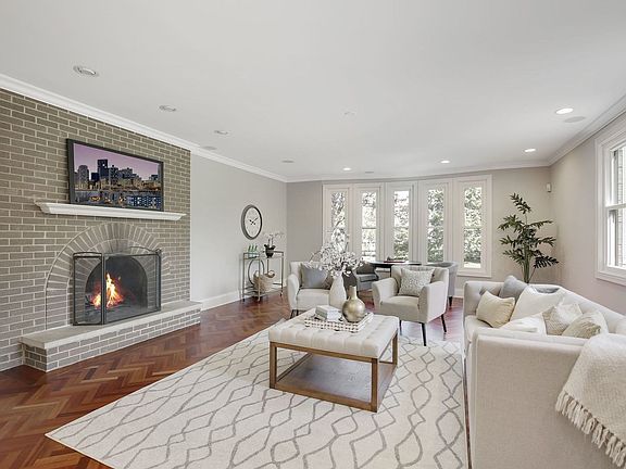 Open to Kitchen. Inlaid brazilian cherry flooring with Herringbone pattern. Wonderful light streams 