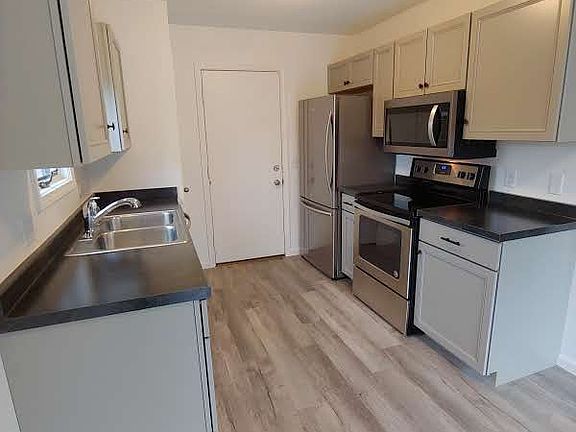 View of kitchen toward garag