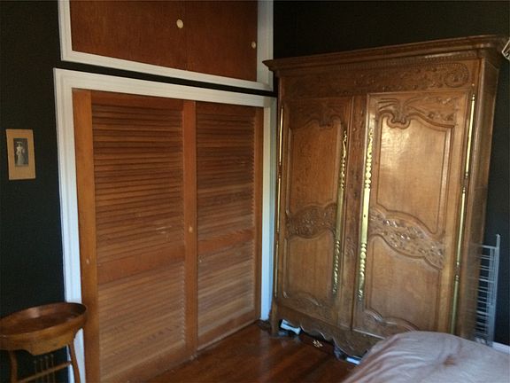 Plenty of closet space, and antique armoire