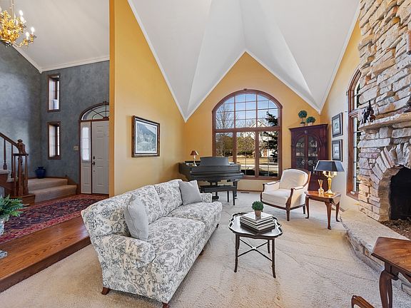Gorgeous Living Room and windows throughout the  home.
