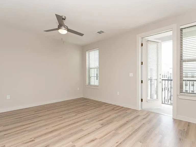 Living Room with Balcony and Hard Surface Flooring