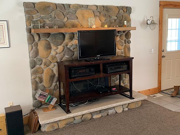 This is a fireplace. Current tenant has TV stand in front of fireplace