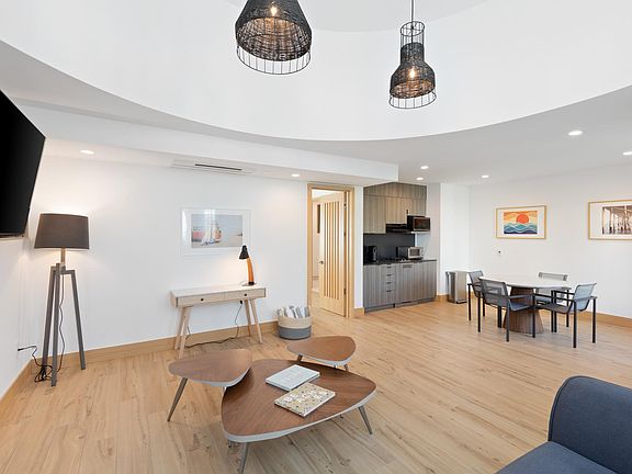 Sit back and unwind in front of the flat-screen TV.