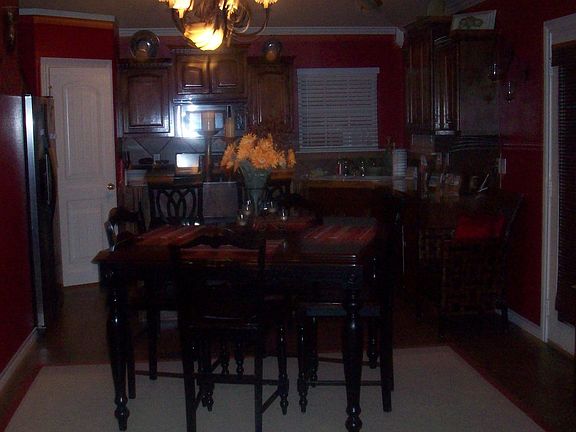 dining area with 18" ceramic tile floor, granite countertops