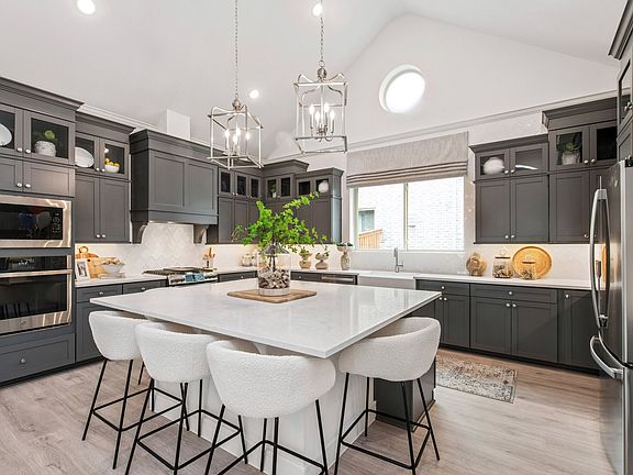 Kitchen with soaring vaulted ceiling