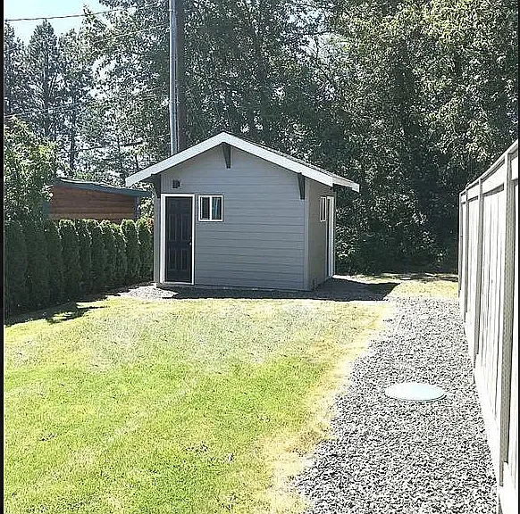 private backyard and storage shed