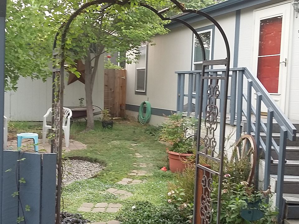 front yard from carport