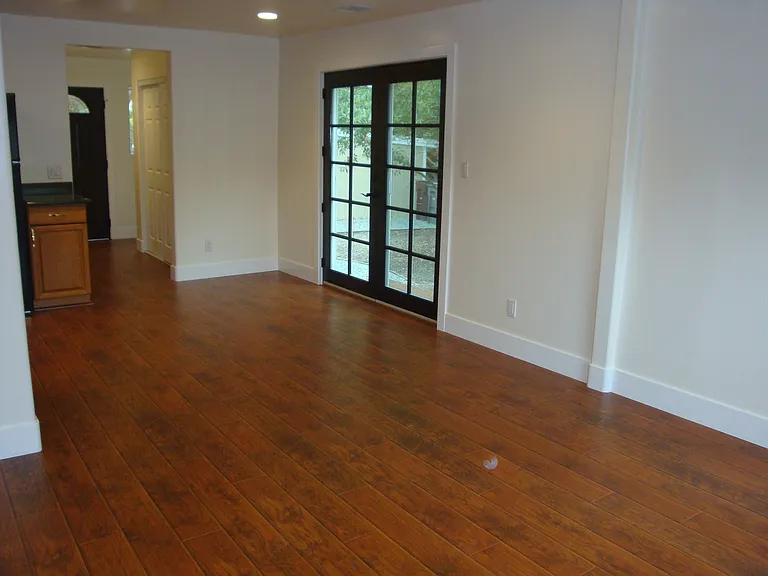 living room looking into dining area and front door