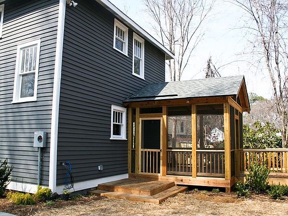 Screened and covered porch with vaulted tongue and groove ceiling