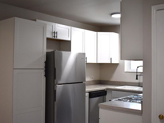 Completely renovated kitchen, new dishwasher, oven, fridge, microwave, and garbage disposal.