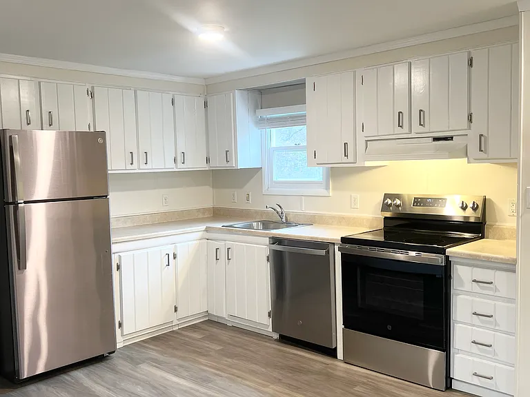 Bright, updated Kitchen with new stainless steel appliances.