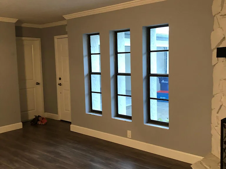 Main entrance entry includes garage door.