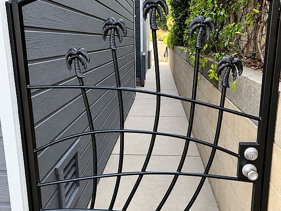 Privacy gate to front door and backyard.