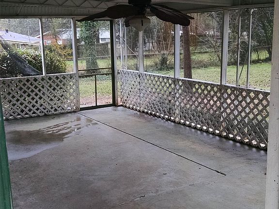 Screened in porch located directly off the kitchen