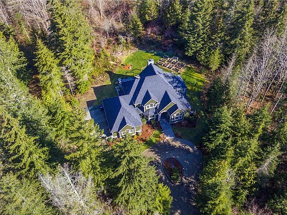 You will love this stately home and the big backyard and patio * Circular driveway * 3 car garage