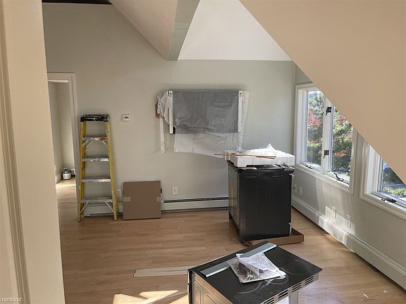 Wall-Mounted Flat-Screen Included