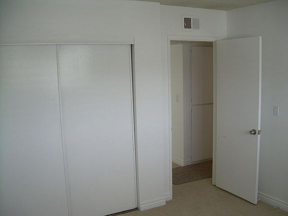  Bedroom #1 - Wall Closet Slider & Linen Cabinets in Hallway