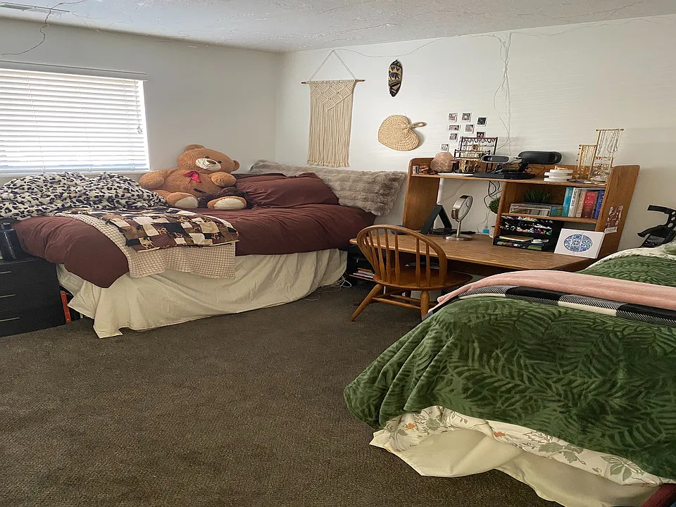 Experience comfort and style in this inviting bedroom designed for relaxation.