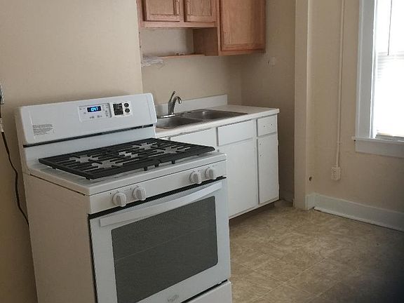 kitchen - now has a microwave over stove.