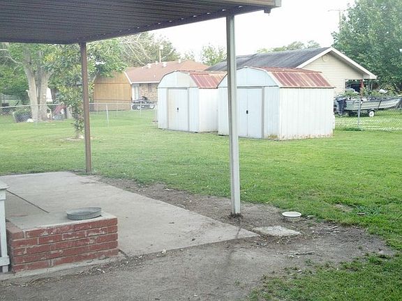 Back Yard
						:
						Two 8x10 storage sheds provide plenty of room for stuff