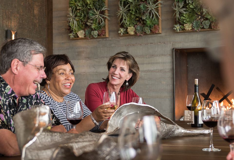 Enjoy a glass of wine with new friends