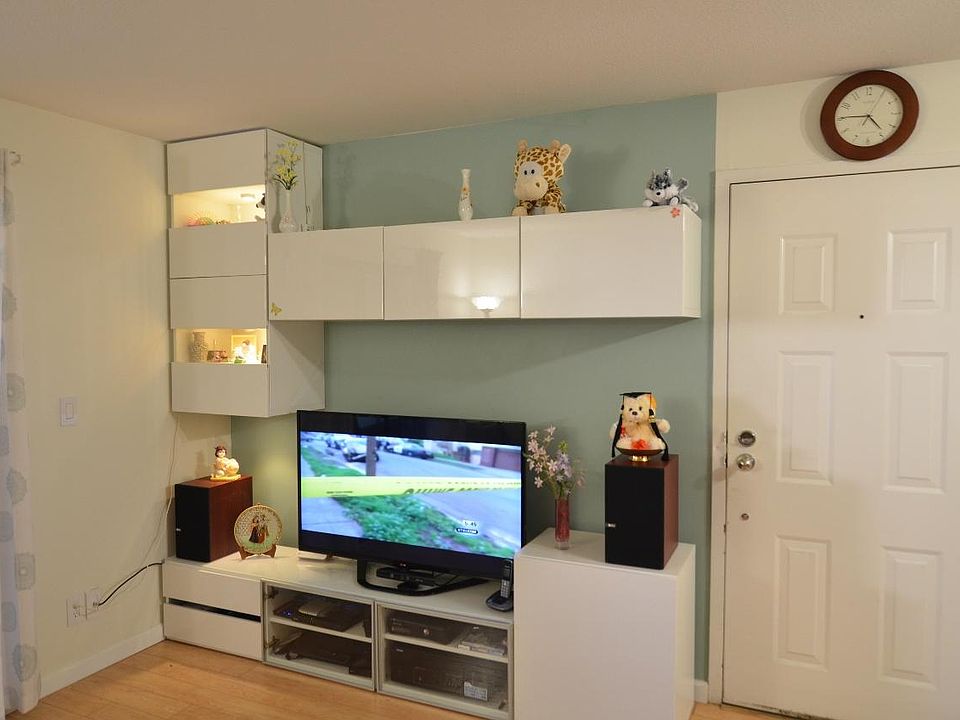 Living room with custom cabinets.