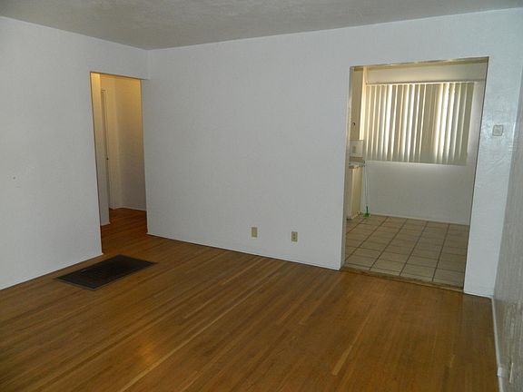 View from living room toward dining nook and kitchen