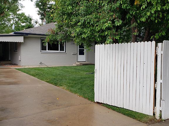 Looking into property from outside gated privacy fence