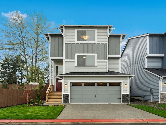 Photo of another home, same plan, in the community.