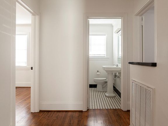 Main floor hall foyer to main floor bedrooms and bath
