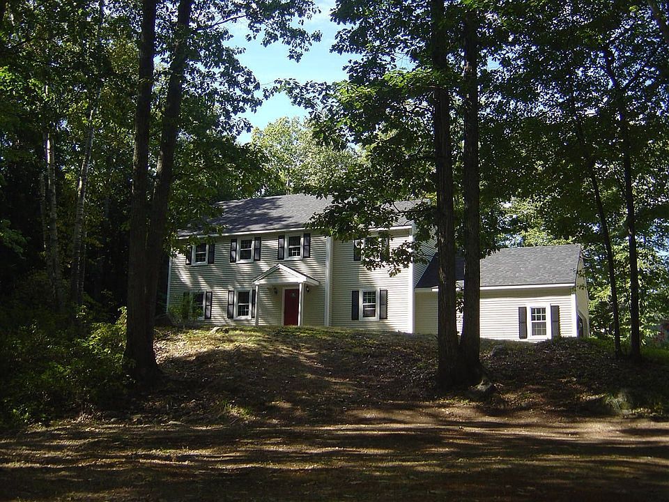 set back from street on private acre