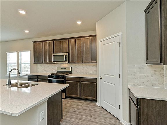 Cook your favorite meal in this beautiful kitchen.