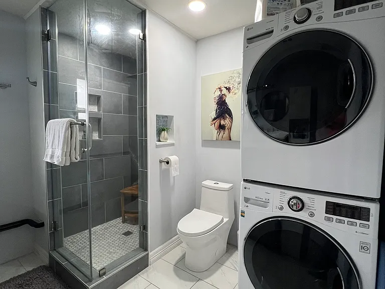 Master bathroom with W&D