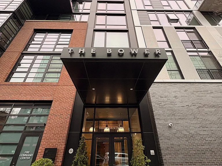 Front door to condo building - secured entrance, elevator and staircase. Only accessible by key fob.
