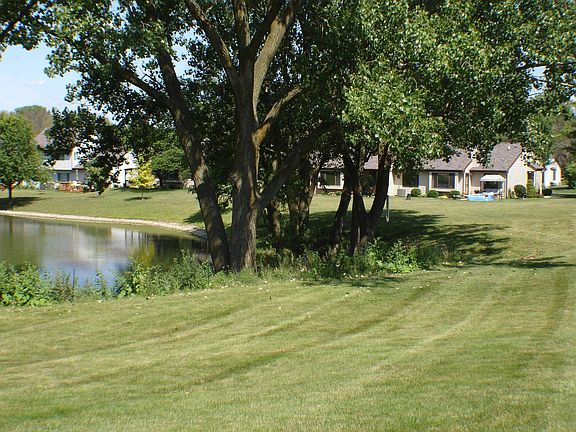 Commons area and water view towards the right behind the condo.