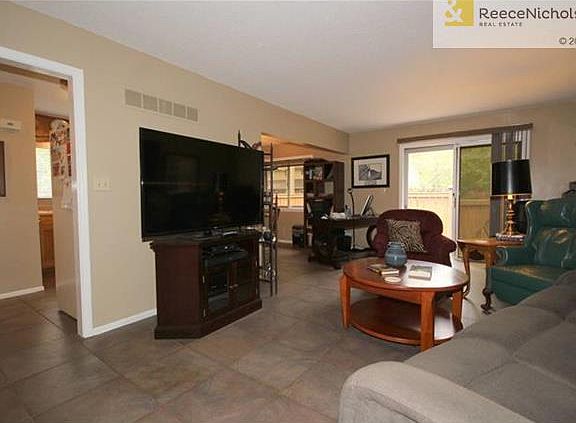 Living Room.  Note Ceramic Tile Floor Extends Into Kitchen & Dining Area.