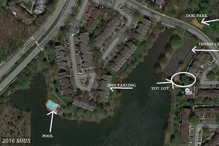 2992 Yarling Ct condo, middle level of 3-level condos, sliding door to back deck facing the community lake