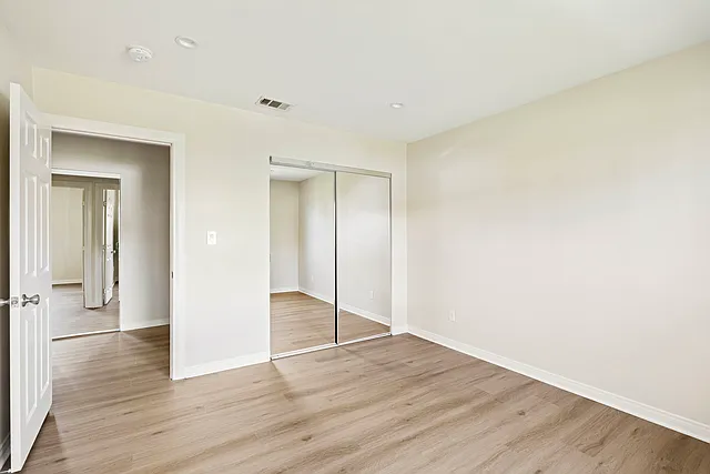 3rd Bedroom with mirrored closet