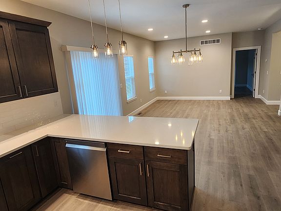 The kitchen adjoins dining and living areas with this open floor plan.