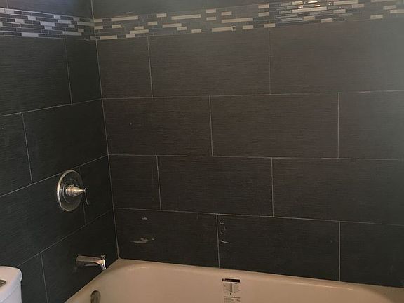 5th image of 16125 Woodruff Ave APT 1